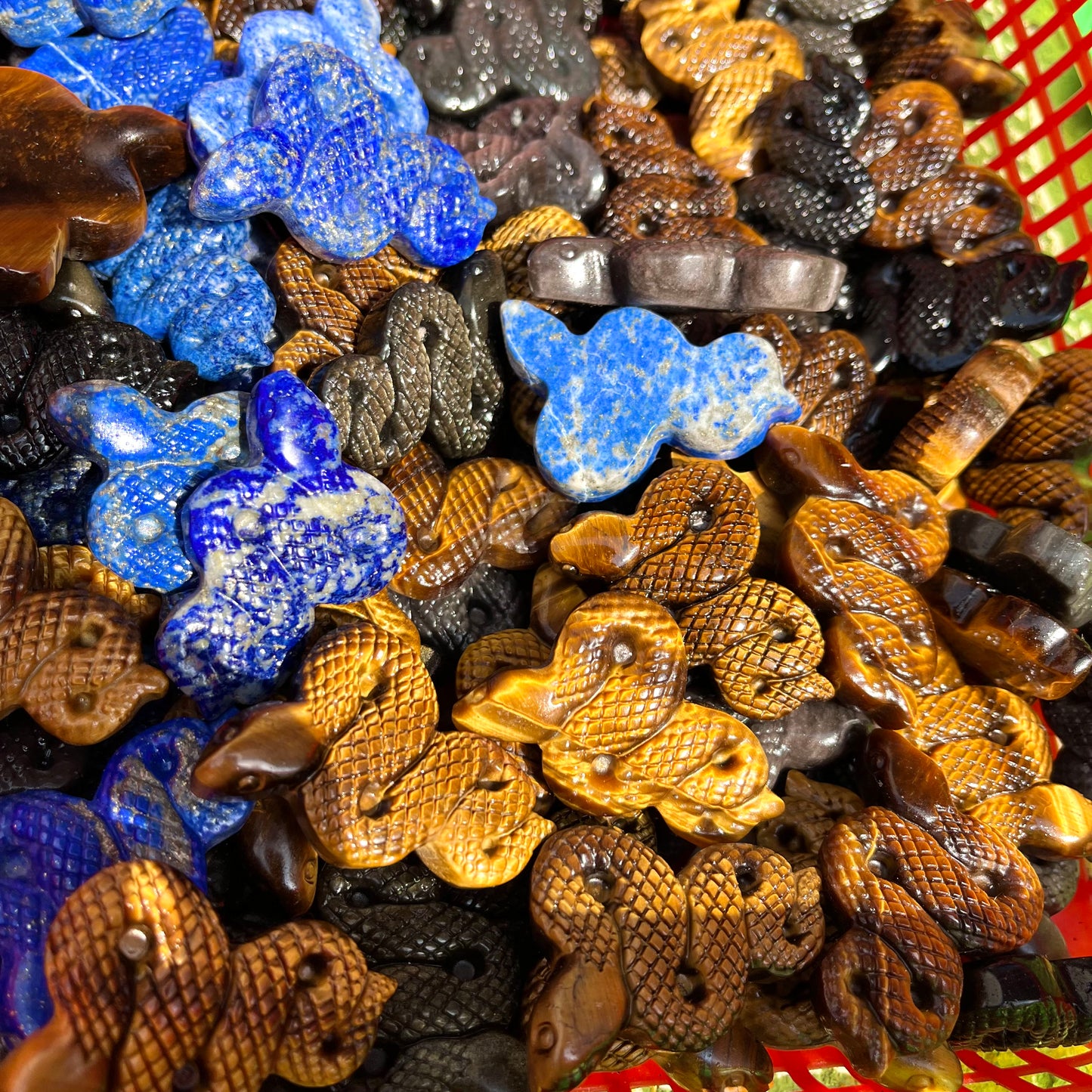 Tiger eye stone snake carving