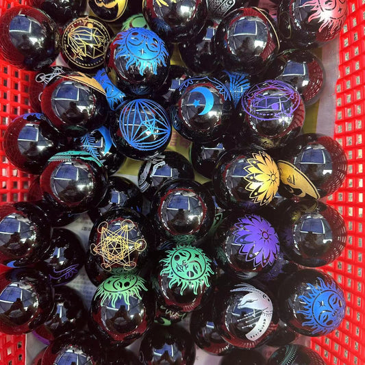 Obsidian sphere with pattern