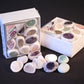 Small gift box of natural raw crystal mixed color dragon egg cut stones